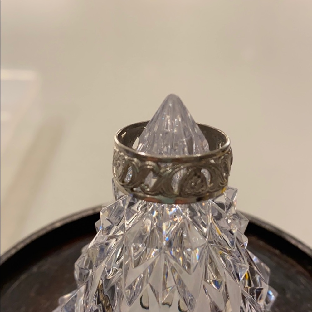 Sterling silver ring with flower heart design